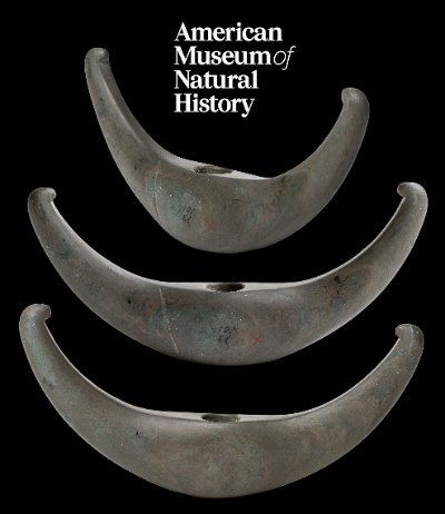 An archival photo from the American Museum of Natural History showing three lunate bannerstones.