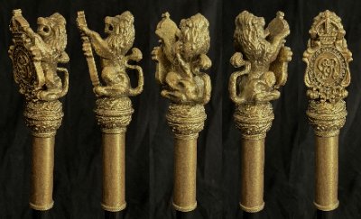 Five sequential angles detailing the gilded lion rampant finial and royal cypher.