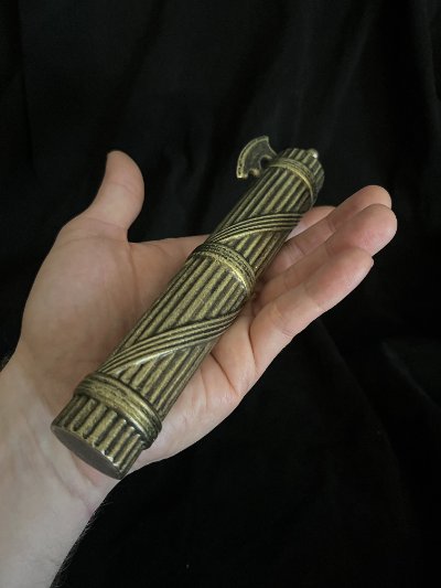 The fasces resting diagonally in a hand to illustrate its overall length.