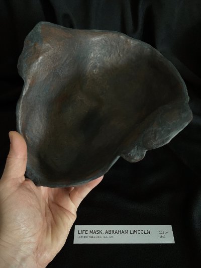 Direct view into the rough hollow interior backside of the reproduction mask.
