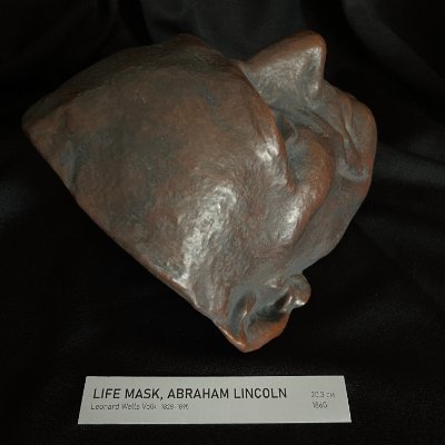 High angle right profile view of the 1860 Abraham Lincoln life mask replica.
