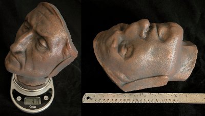 Measurement documentation showing the effigy on a digital scale and beside a ruler.