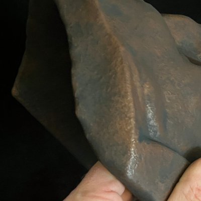 Extreme close-up of the mask margin to show material composition and wall thickness.