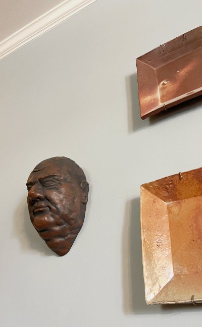 The replica is displayed wall-mounted for visual context.