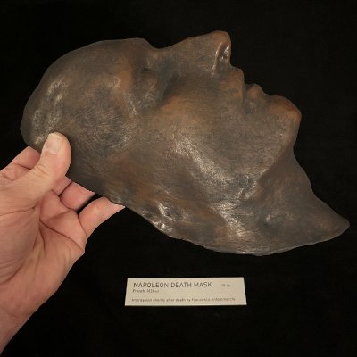 Right profile of the 1821 Napoleon replica held in hand to demonstrate physical scale.