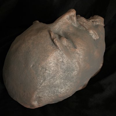 Top-down perspective showing the upper dome of the Shakespeare death mask.