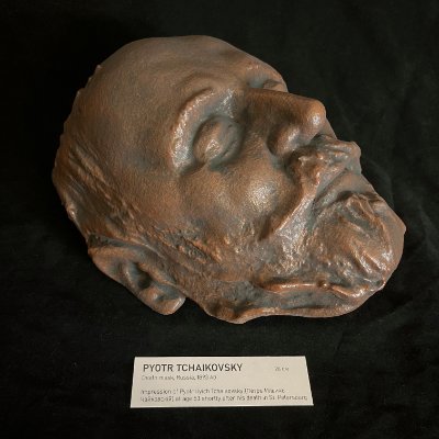 Three-quarter left profile of the Tchaikovsky replica displayed with its identification tag.