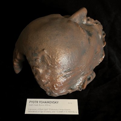 Top-down view emphasizing the hollow interior cavity and upper edge of the life mask.