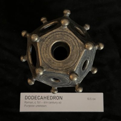 Direct frontal view of a single dodecahedron face showcasing the circular opening and concentric rings.
