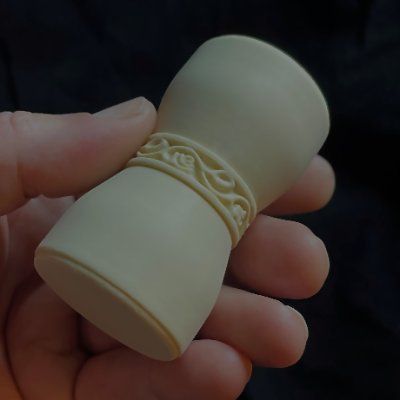 A close-up view shows the hand-sculpted U.S. Senate replica gavel displaying its decorative carved band.
