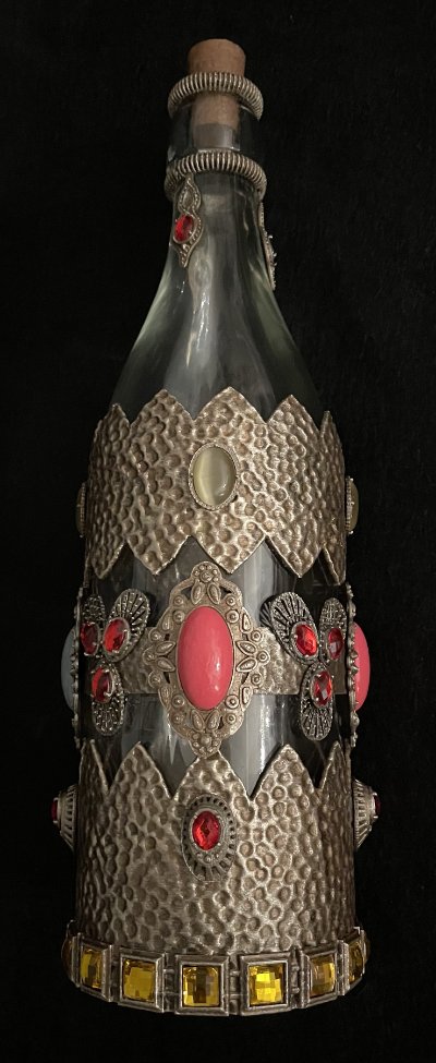 Full standing view of the 16-inch theatrical wine bottle prop with intricate jewel embellishments.
