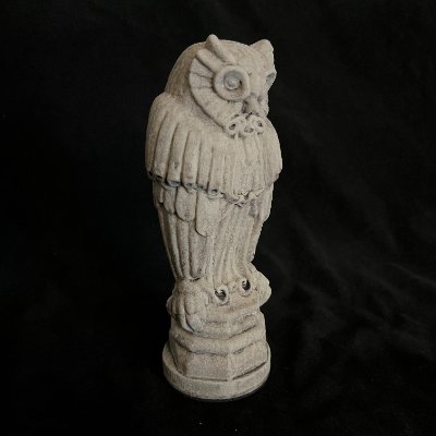 Right angled perspective of the hand-finished owl replica highlighting the classic patina.